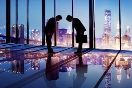 Japanese businessmen bowing